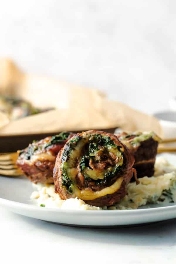 Grilled Flank Steak stuffed with spinach and havarti cheese.