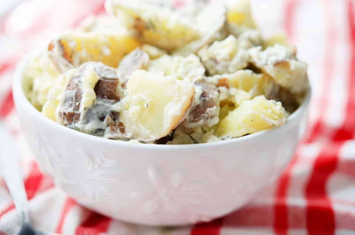 Red Bliss Dill Potato Salad in a white bowl