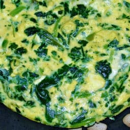 A close up of spinach havarti frittata