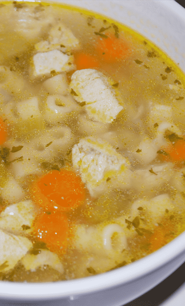 Chicken Ditalini Soup made with bone-in chicken breast, vegetables and Ditalini pasta in a low sodium chicken broth.