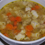 A bowl of soup, with Chicken and Ditalini