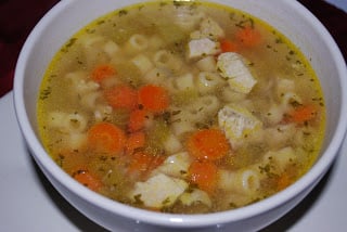 A bowl of soup, with Chicken and Ditalini