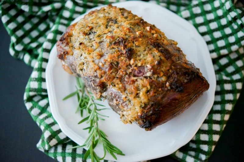 Horseradish, Garlic &amp; Rosemary Encrusted Roast Beef on a plate.