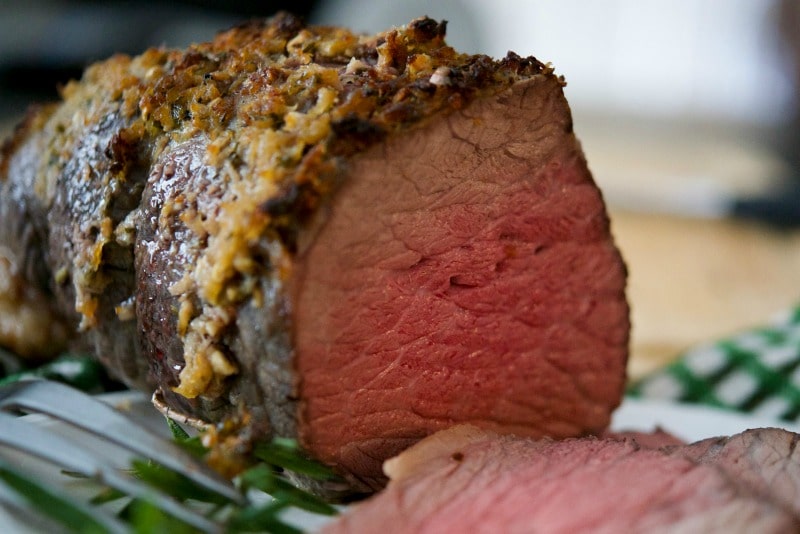 Horseradish, Garlic and Rosemary Encrusted Roast Beef carved