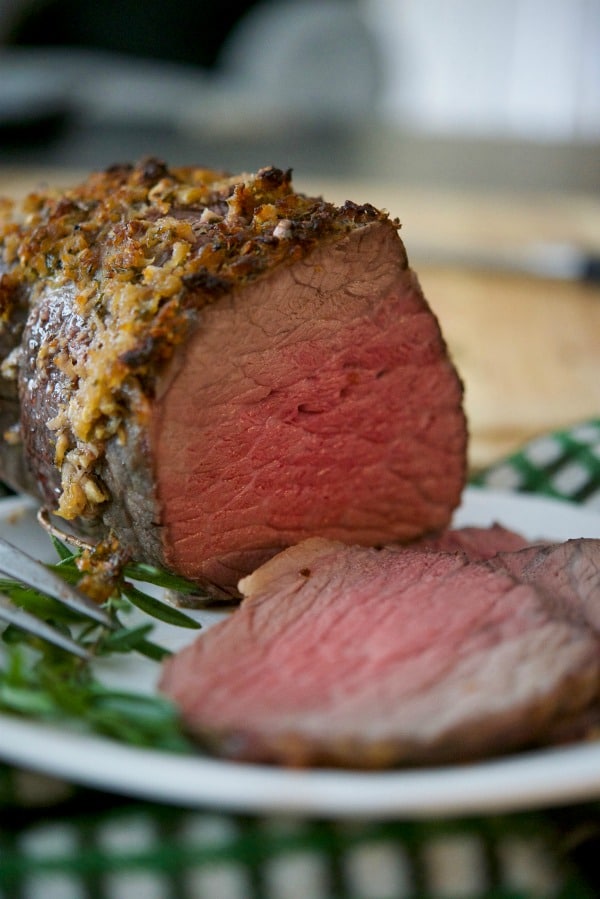 Roast Beef topped with a mixture of horseradish, garlic, and fresh rosemary is the perfect meal for a Sunday afternoon.