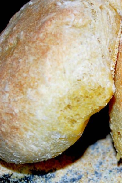 This Rosemary Semolina Boule Bread made with bread flour, cornmeal and fresh rosemary makes the perfect bread bowl for your favorite soup.
