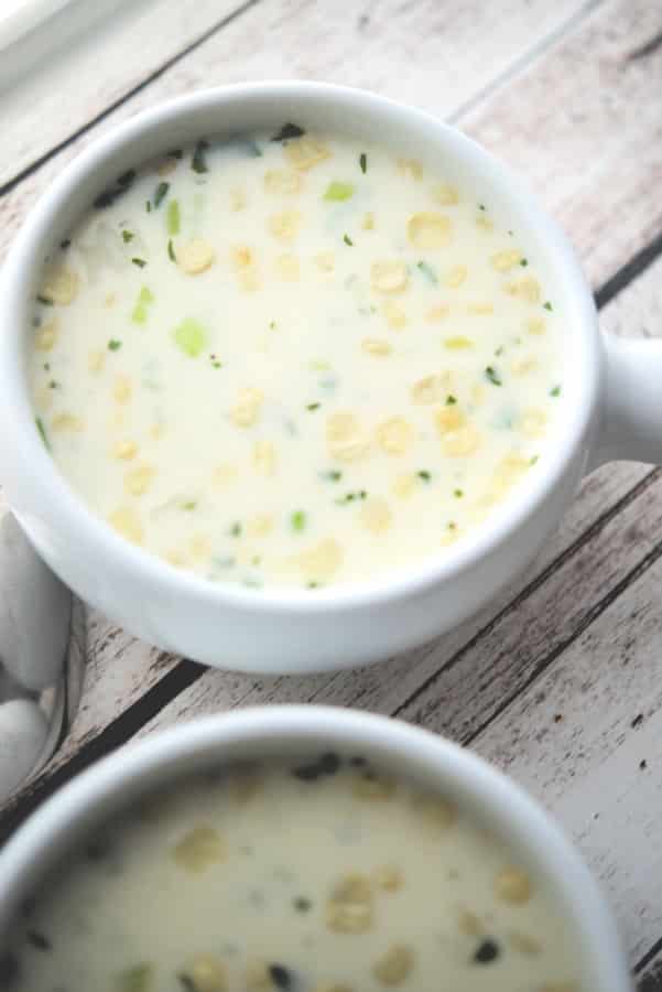 Basil Corn Chowder made with corn, potatoes and fresh basil in a creamy broth based soup is deliciously flavorful and perfect for lunch or dinner.