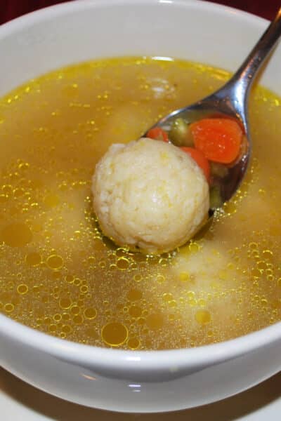 Italian Matzo Ball Soup is a chicken broth based soup with matzo balls made with fresh rosemary and grated Pecorino Romano cheese. 