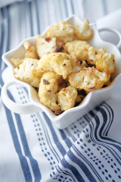 Sun Dried Tomato Pesto Roasted Cauliflower in a bowl.