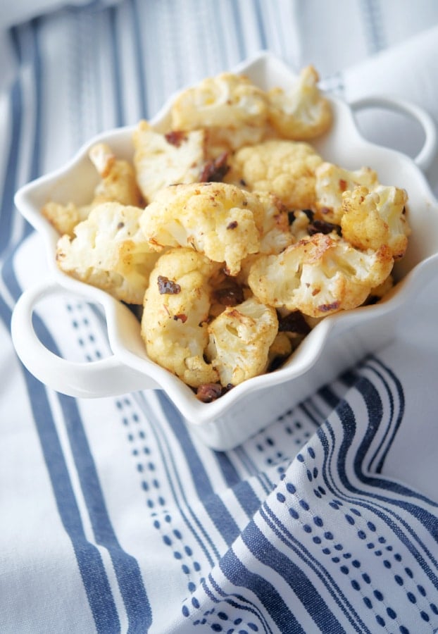 Sun Dried Tomato Pesto Roasted Cauliflower in a bowl.