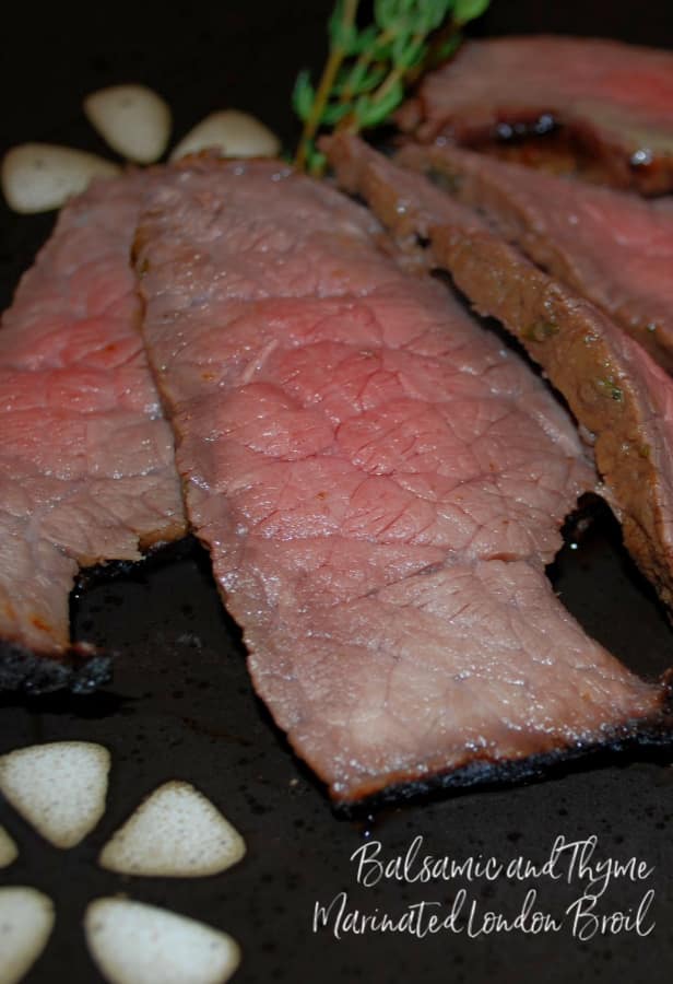 Grilled London broil steak marinated in balsamic vinegar, white wine, oil, garlic powder and fresh thyme is deliciously flavorful and tender. 