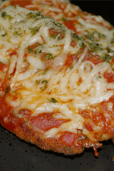 A close up of chicken parmesan