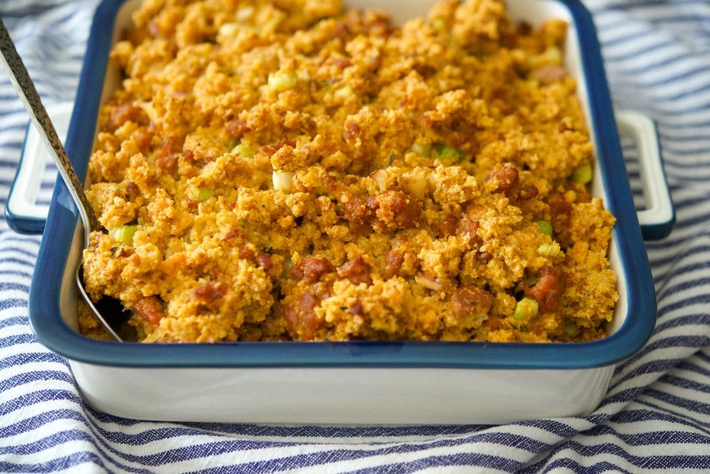 A close up of food on a tray, with Stuffing and Chorizo