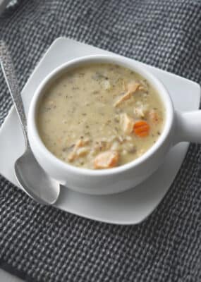 Chicken & Wild Rice Soup in a white soup bowl.