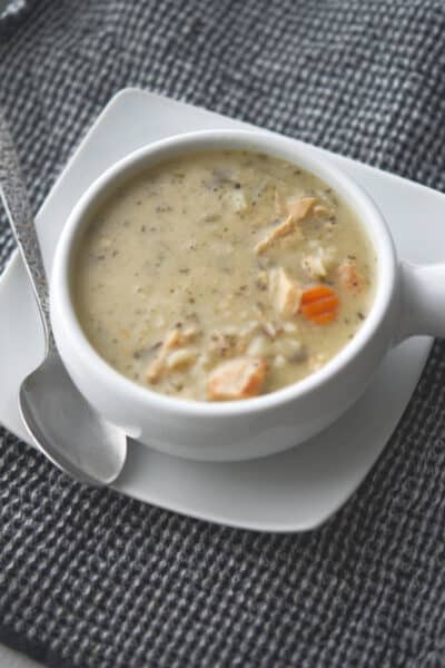 Chicken & Wild Rice Soup in a white soup bowl.