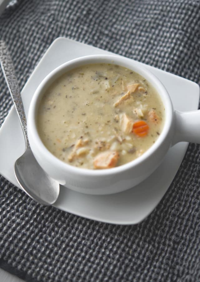 Chicken & Wild Rice Soup in a white soup bowl. 