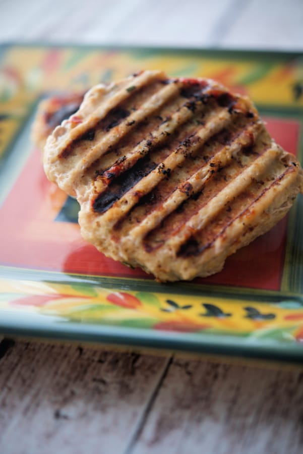 Grilled Sun Dried Tomato Turkey Burger on a plate. 