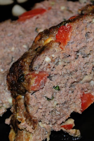 Tomato, Basil and Feta Meatloaf made with lean ground beef, vegetables and crumbled Feta cheese makes a super flavorful weeknight meal. 