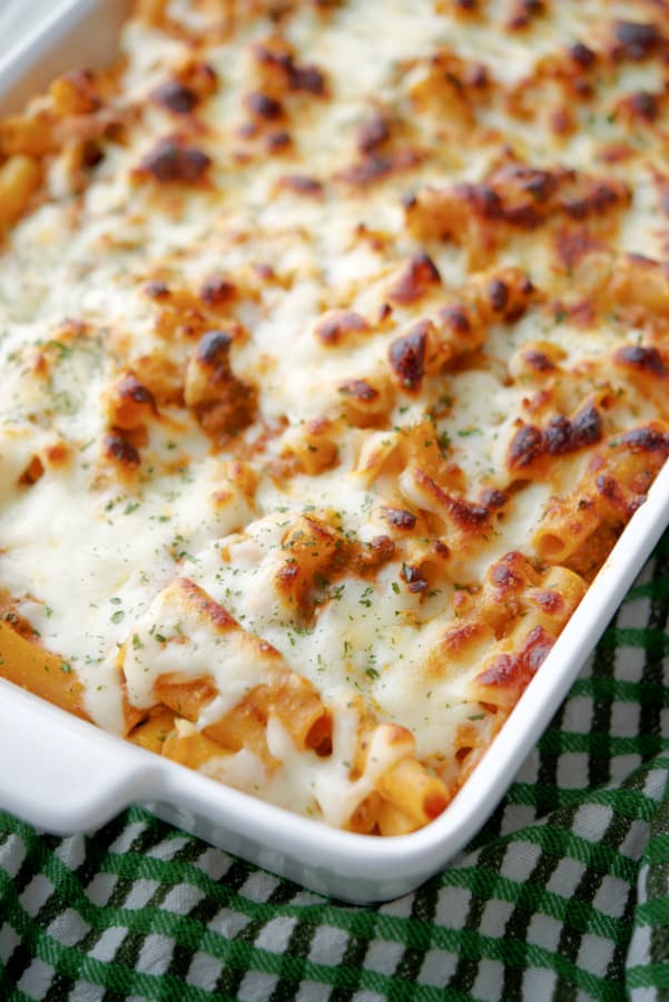 Baked Ziti with Meat Sauce is a classic casserole dish made with your favorite marinara sauce, ground beef, Ricotta and Mozzarella cheeses. 