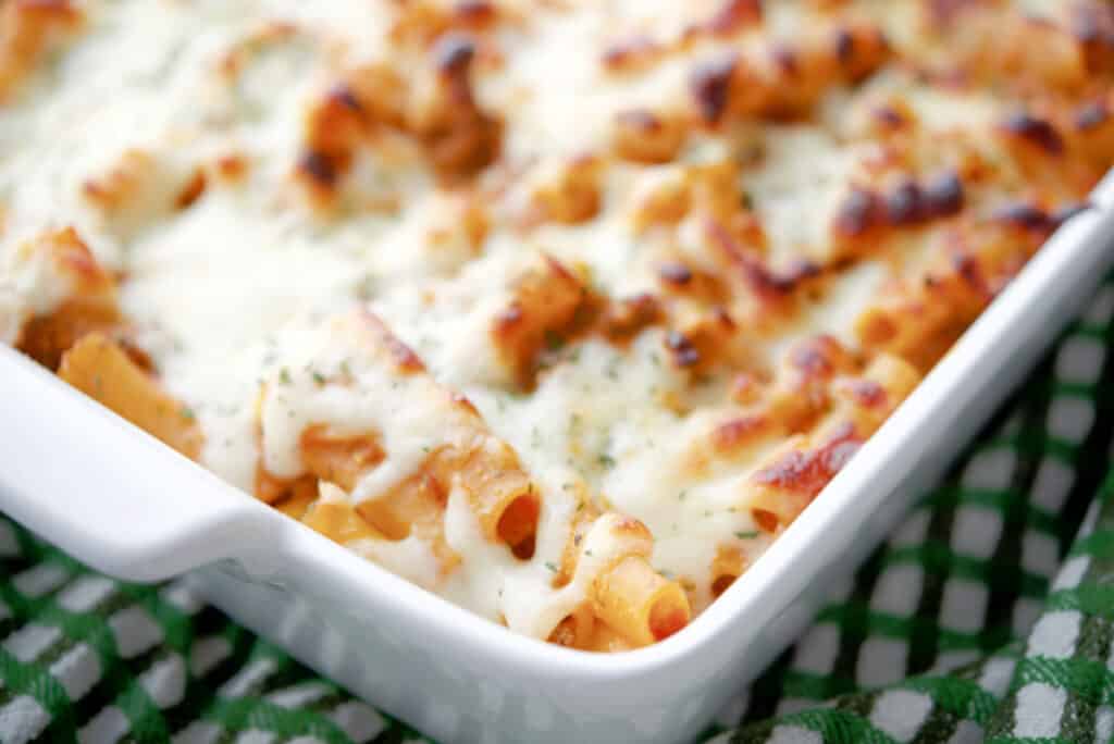 Baked Ziti in white casserole dish