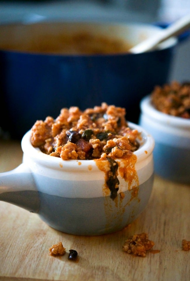 Ground chicken and black bean chili in a soup crock.