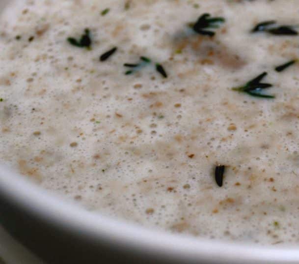 Mushroom and Thyme Soup made with white button mushrooms, onions, fresh thyme, heavy cream and milk is deliciously creamy.