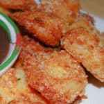 Jumbo shrimp coated in a mixture of potato flakes, orange zest and fresh thyme; then fried until golden brown. 