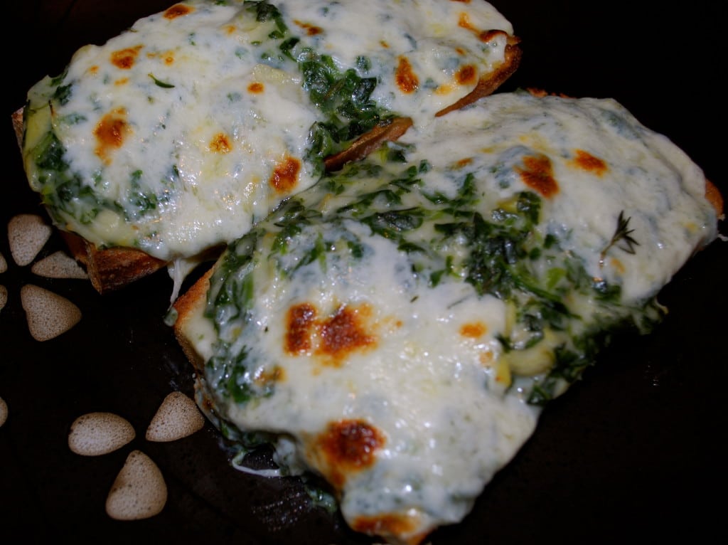 These Spinach Artichoke French Bread Pizza's make for a tasty meatless weeknight meal. The topping can also be used for a dip as well!