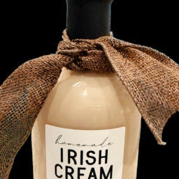 a bottle of irish cream with a brown bow