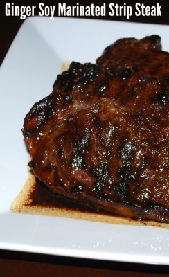 A close up of food on a plate, with Strip steak