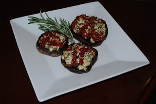 A plate of food on a table, with Mushroom and Gorgonzola