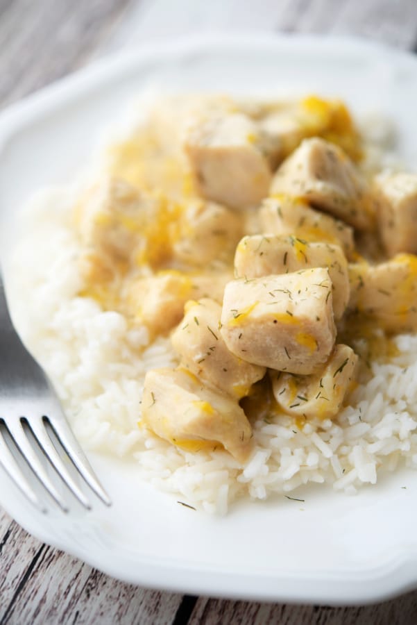 Honey Tangerine Chicken over Rice on a plate