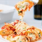 Manicotti made with homemade pasta shells filled with a mixture of Italian cheeses; then topped with your favorite marinara sauce. 