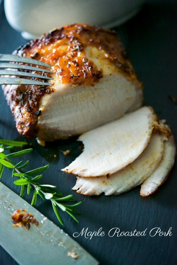 A plate of food with a slice cut out, with Pork and Loin