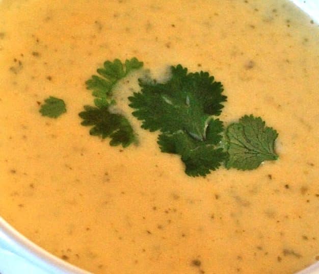Mexican Beer Cheese Soup made with Corona beer, cilantro and a shredded Cheddar, Monterey Jack, Queso Quesadilla and Asadero Cheeses.