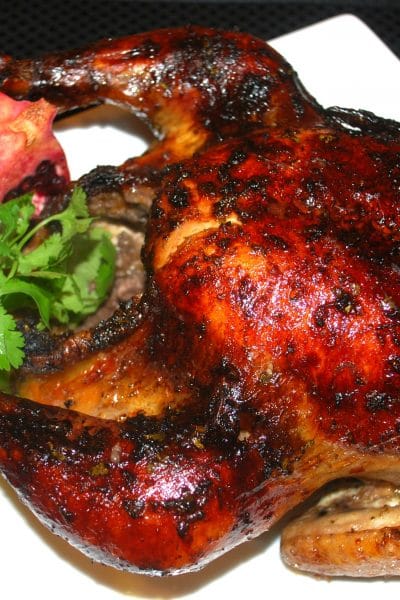 Whole roasted chicken with pomegrante