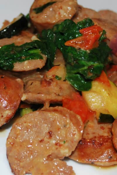 Sweet Italian sausage roasted with fennel, zucchini, spinach, tomatoes and fresh rosemary in a light white wine broth. 