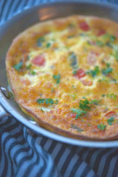 This frittata made with tomatoes, fresh Mozzarella cheese and fragrant basil is easy to make and makes a tasty breakfast any day of the week. 