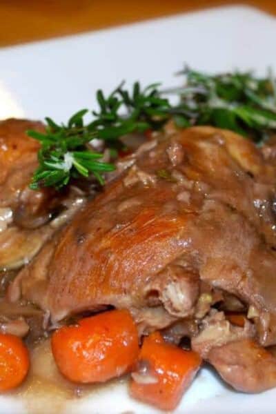 A close up of coq au vin.