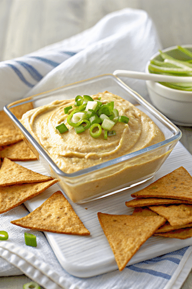 roasted chickpea and leek hummus in a glass dish