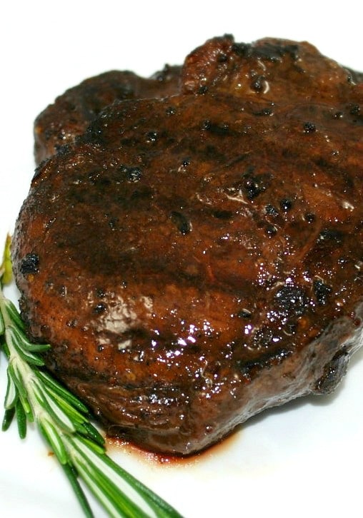 A close up of filet mignon on a plate. 