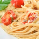 Whole grain linguine pasta tossed with creamy fresh mozzarella, grape tomatoes, basil and grilled chicken.