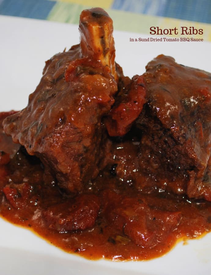 These Beef Short ribs slowly cooked in a fragrant Sun Dried Tomato BBQ Sauce are fall off the bone tender and delicious!
