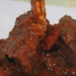 These Beef Short ribs slowly cooked in a fragrant Sun Dried Tomato BBQ Sauce are fall off the bone tender and delicious!