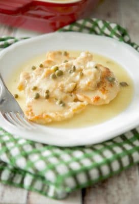 Chicken Piccata made with boneless, chicken breasts that have been lightly floured and pan sautéed; then topped with a white wine lemon caper sauce.