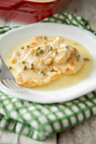 Chicken Piccata made with boneless, chicken breasts that have been lightly floured and pan sautéed; then topped with a white wine lemon caper sauce.