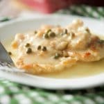 A close up of a plate of food, with Chicken Piccata