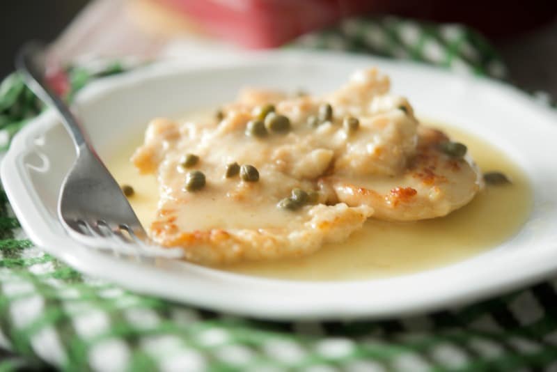 A close up of a plate of food, with Chicken Piccata