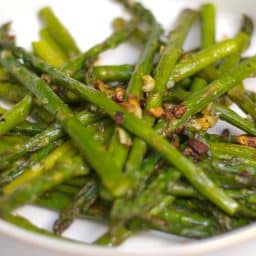 Fresh asparagus tossed with garlic, extra virgin olive oil, Kosher salt and fresh ground pepper; then roasted until caramelized. 