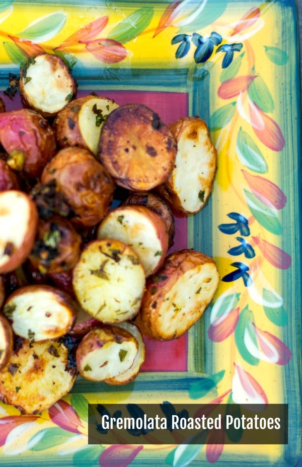 A close up of many different types of food, with Gremolata and Potato